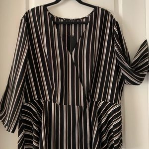 NWT L.N.V faux wrap blouse with flounce